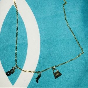 Coach charm necklace!